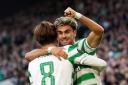 Celtic hero helps young fan announce he is cancer free