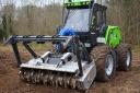 The MM250X is a multi-tool forestry tractor with a three-point linkage on the front, and is hydraulically driven.