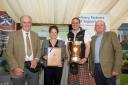 Rural Affairs Secretary Mairi Gougeon presents the Dulverton Flagon to Ardachuple, Kyles of Bute at 2023’s awards ceremony.