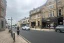 Shannon Currah from Saks Hexham next to the newly resurfaced road