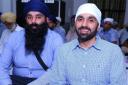 Jagtar Singh Johal, right, pictured alongside his brother Gurpreet