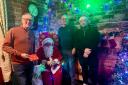 Llanfyllin Councillors with Father Christmas during the town's festive market and lights switch on.