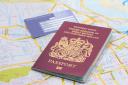 What are the rules for using a red UK passport for travel?