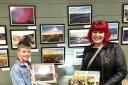 Noa Jac Hughes, winner of a Machynlleth photography competition, with second prize winner Rwth Hughes.