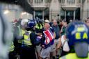 Police clash with protesters in London during the summer