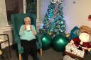 A Victoria Care Home resident with her Christmas card