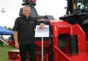 Ufkes Greentec’s Mark Jibson with the 942 on a Valtra.