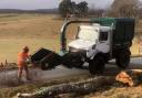 Xander feeding the chipper for a job, for Savills, on Muckrach Estate, Dulnain Bridge.