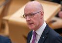 First Minister John Swinney.