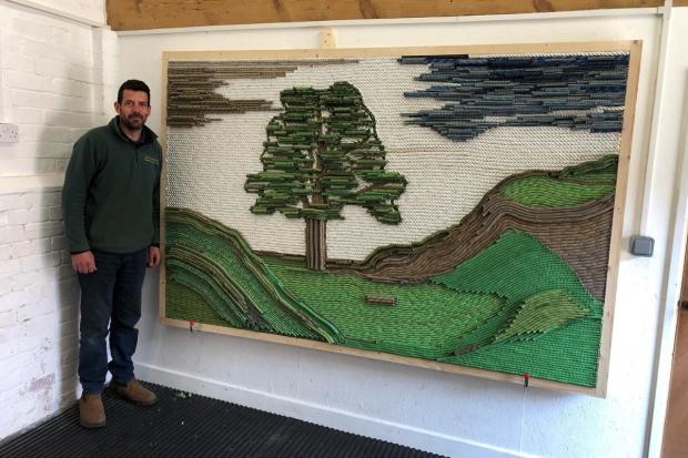 Chris Wyatt of CTS Forestry with his artwork