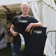 Tegid Evans proudly shows off the Ripper37 blades and several t-shirts his partner had made for the ARB Show