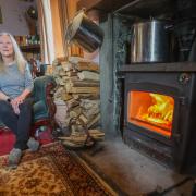 Ann Quinton of Elvanfoot with her wood-burning stove STY VA..Picture Gordon Terris Herald & Times..24/5/24.