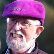 Bill Mason - pictured in his distinctive purple hat - was a popular and well-known figure in British forestry