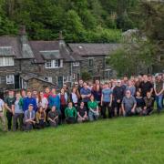 The first two cohorts on the degree apprenticeship programme, pictured at Ambleside. The group photo also shows Mark Tomlinson (kneeling in the front row) and apprentice link tutor Emily Dixon (far right).