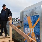 Allan Marshall with the Binderberger SSPX800 fully automated firewood processor.