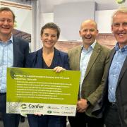 Stuart (left) with Mary Creagh and David Robertson, Director of Investment & Business Development at Scottish Woodlands (2nd right)  and David Leslie, Joint Managing Director, James Jones & Sons (right) taken at Labour conference in Liverpool