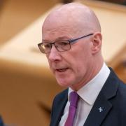 First Minister John Swinney.