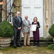 King Charles III was presented with his Honorary Fellowship by  Geraint Richards and Louise Simpson