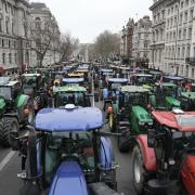 Tractors parked on Whitehall during a protest by farmers in Westminster, London, over the changes to inheritance tax (IHT) rules in the recent budget