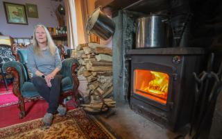 Ann Quinton of Elvanfoot with her wood-burning stove STY VA..Picture Gordon Terris Herald & Times..24/5/24.