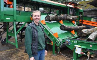 Georgia Heard with Andrew Heard Logs’ latest bit of kit, a Posch K-710 a-Vario firewood producer.