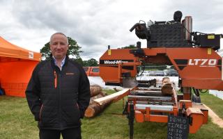 Keith Threadgall and his WoodMizer LT70.